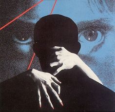 a movie poster with a man's hand on his face