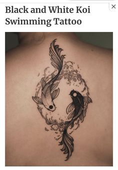 the back of a woman's shoulder with two koi fish on it