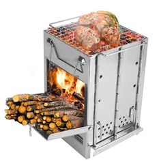 an outdoor grill with logs and food cooking inside