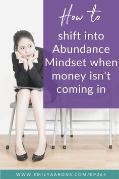 a woman sitting in a chair with her head on her hand and the words how to shift into abundance minds when money isn't coming in