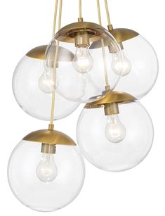 three clear globe lights hanging from a ceiling fixture with gold metal fittings and glass balls