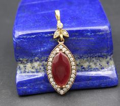 "I am offering you beautiful Turkish ottoman sterling silver & bronze drop pendant. Its %100 handcrafted workmanship with beautiful glass Ruby stone & Topaz beads with Unique workmanship. Please do not hesitate to contact if you have any questions. Weight : 7.6 grams, Length : Inches : 1.8\" ( 4.5cm ) Width : Inches 0.6\" ( 1.5cm ) Shipping & Estimated Delivery Time With Turkish Registered Post, Destination CountryStandard Shipping (business days) United States 15-20 Europe7-15 Asia1 Traditional Handmade Drop Jewelry, Traditional Gemstone Beads And Cabochons For Gifts, Handmade Antique Beads, Gems And Cabochons For Jewelry Making, Antique Handmade Beads Gems And Cabochons For Gift, Antique Beads, Gems, And Cabochons As Gifts, Antique Handmade Beads As Gift, Antique Handmade Beads For Gifts, Ottoman Jewelry, Turkish Ottoman