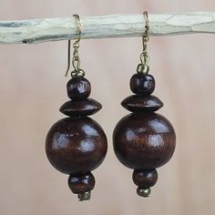 Brown Wood Disc and Round Bead Dangle Earrings from Ghana - Casually Elegant | NOVICA Cheap Formal Round Bead Earrings, Fair Trade Brown Jewelry With Round Beads, Brown Fair Trade Round Bead Jewelry, Brown Wooden Beads Round Jewelry, Brown Wooden Beads Round Earrings, Brown Wooden Beads Jewelry, Brown Round Wooden Beads Jewelry, Artisan Brown Beaded Earrings For Pierced Ears, Unique Brown Earrings With Dangling Beads