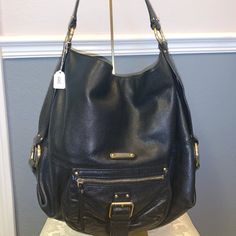 For Sale Is A Black Leather Michael Kors Hobo Bag. The Bag Features A Single Leather Handle, Gold Michael Kors Detailing, And A Magnetic Snap Closure. The Bag Is Authentic, Registration: C-1004! The Bag Comes From A Smoke And Pet-Free Home. Note: The Bag Has Slight Stich Fraying On The Handles, But The Functionality Of The Bag Is Not Affected. Michael Kors Metal Hardware Tote Shoulder Bag, Michael Kors Hobo Shoulder Bag For Travel, Michael Kors Bag With Silver-tone Hardware For Everyday, Black Hobo Bag With Double Handle And Branded Hardware, Michael Kors Soft Leather Bags For Office, Black Hobo Bag With Branded Hardware For Travel, Black Double Handle Hobo Bag With Branded Hardware, Michael Kors Shoulder Bag With Metal Hardware, Michael Kors Shoulder Bag With Gold-tone Hardware For Everyday