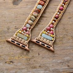 Bliss Boho Apple Watch Band Wrap Dress up your tech with this unique Boho Apple Watch band! Our wrap-around watchband is beautifully handcrafted using calming natural Rhodonite and Jasper stones loomed on natural brown cord. It comes with an adjustable closure to fit most wrist sizes. Refresh your smartwatch with these special beaded straps. Our boho watch strap is the perfect gift for yourself, the independent, or the free-spirited. And of course, get the benefits of the natural stones while we Boho Watch, Apple Watch Bracelets, Bracelet Apple Watch, Wristband Bracelet, Healing Crystal Jewelry, Apple Watch Faces, Jasper Beads, Apple Watch Strap, Accessories Bracelets