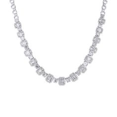 This exquisite Carlotta Diamond Necklace is the epitome of luxury. Its baguette cut and round brilliant diamonds, totaling 7 3/4 carats and crafted from 14 karat gold, form a stunning collar style that evokes the elegance of the opera. Indulge in this timeless and sophisticated piece, fit for the most discerning of tastes. Luxury Diamond Necklace With Baguette Diamonds, Luxury Silver Baguette-cut Diamond Necklace, Luxury Silver Baguette Cut Diamond Necklace, Formal Baguette Diamond Necklaces, Formal Diamond White Necklace With Baguette Diamonds, Formal Diamond Necklace With Baguette Diamonds, Luxury Diamond Necklace With Emerald Cut And Prong Setting, Luxury Diamond Necklace With Emerald Cut In Prong Setting, Luxury Emerald Cut Diamond Necklace With Prong Setting