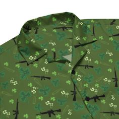 Introducing the "Emerald Isle Breeze Button-Up Shirt" – your ultimate summer companion that combines festive charm with unparalleled comfort. Designed for those who celebrate St. Patrick's Day and the summer sun with equal enthusiasm, this shirt boasts a unique pattern featuring traditional clovers intertwined with subtle, iconic silhouettes. It's not just about good looks; the shirt is crafted with a blend of 65% recycled polyester and 35% polyester, making it a choice that's as kind to the pla Green Military Style Short Sleeve Top, Green Military Style Button-up Shirt, Green Military Button-up Top, Irish Clothing, Clover Pattern, Clover Green, Emerald Isle, Medical Scrubs, Four Leaf