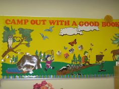 there is a bulletin board on the wall with an image of children's farm animals