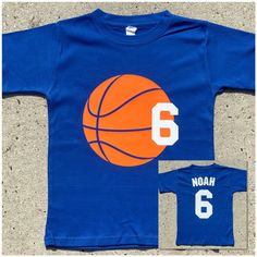 a blue shirt with an orange basketball on the front and number 6 on the back