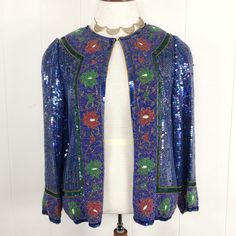 "VTG Judith Ann Creations Blue Jacket Floral Sequins Beads Silk Medium Beautiful sequin and beaded jacket! Silk lined with small shoulder pads. Closes with eye and hook closure. The jacket is heavy weighing a little over 2lbs. Gently worn. There are some beads missing from the back collar and on the front collar. There is a small row of sequins missing on the front. Difficult to see when worn. Tagged size medium, see measurements to ensure proper fit. Measured flat not stretched. Bust: 40\" Wais Luxury Blue Sequined Outerwear, Beaded Jacket, Beaded Cocktail Dress, Sequin Beading, Blue Jacket, Shoulder Pads, Favorite Outfit, Bathing Beauties, Jackets & Coats