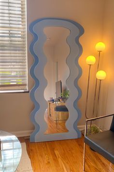 Cozy living room. Blue home decor. Wavy mirror. Eclectic decor. Funky mirrors. Curvy Mirrors, Pastel Bakery, Curvy Mirror, Mirror With Storage, Blue Room Decor, Preppy Bedroom, Basement Bedroom, Future Room, Pastel Room