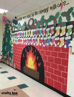 a classroom wall decorated with christmas decorations and paper cutouts on the brick fire place