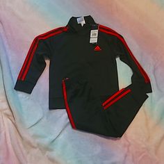 Nwt Adidas Black With Red Stripes Two Piece Track Suit. Little Boys Size 4 (Xs) Sporty Red Long Sleeve Set, Red Long Sleeve Sports Sets, Red Sports Sets For Winter, Red Winter Sports Sets, Fitted Red Playwear Sets, Adidas Fitted Winter Sets, Adidas Fitted Long Sleeve Sets, Winter Adidas Fitted Sets, Sporty Fitted Adidas Sets