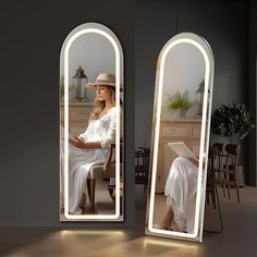 a woman sitting on a chair in front of a large mirror with her legs crossed