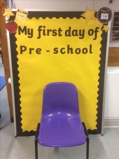 a purple chair sitting in front of a sign that says my first day of pre - school