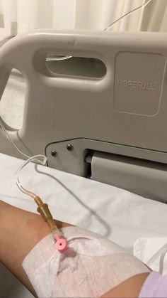 an iv machine hooked up to a patient's arm