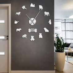 a clock that has dogs on it in the middle of a room next to a door