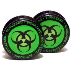 two green and black biohazard wheels with the words biohazard on them