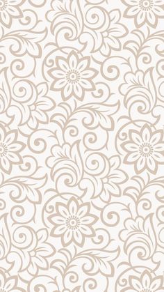 a beige and white floral wallpaper with swirly flowers on it's sides