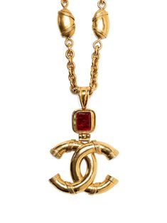 gold-plated brass 1994 stone-embellished CC necklace from Chanel Pre-Owned featuring cable-link chain, signature interlocking CC logo, gemstone detailing, toggle fastening and circa 1994. Please be mindful that this piece has led a previous life, and may tell its story through minor imperfection. Purchasing this item continues its narrative, so you can be confident that you’re making a POSITIVELY CONSCIOUS choice for the planet.. | Chanel Pre Owned 1994 stone-embellished CC necklace Gold-tone Logo Plaque Pendant Necklace, Metal Pendant Necklace With Gold-tone Logo Plaque, Metal Pendant Jewelry With Gold-tone Logo Plaque, Luxury Gold-tone Logo Plaque Pendant Jewelry, Luxury Pendant Jewelry With Gold-tone Logo Plaque, Formal Gold-tone Logo Plaque Pendant Jewelry, Formal Gold-tone Logo Pendant Jewelry, Elegant Gold-tone Logo Plaque Pendant Jewelry, Elegant Gold-tone Pendant Jewelry With Logo Plaque