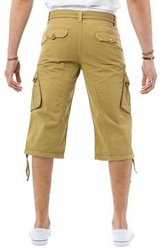 Style an on-trend look in cargo shorts crafted from breathable cotton for comfort during casual outings. 18" inseam; 10" front rise (size 32) Zip fly with button closure 100% cotton Machine wash, tumble dry
 Imported Model stats: 6'1" height, 32" waist. Model is wearing size 32. Summer Knee-length Cargo Shorts With Hip Pockets, Summer Knee-length Cargo Pants With Built-in Shorts, Short Length Cargo Pants For Summer Outdoor, Summer Outdoor Short Cargo Pants, Khaki Cargo Shorts With Pockets For Summer, Summer Outdoor Short Length Cargo Pants, Utility Bermuda Knee-length Shorts For Summer, Summer Utility Bermuda Knee-length Shorts, Utility Style Knee-length Bermuda Shorts For Summer