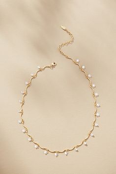 14k gold-plated brass, cubic zirconia Lobster clasp Imported | Drippy Crystal Necklace by Anthropologie in Gold, Women's, Gold/Plated Brass/Cubic Zirconia Pearl Dainty Jewelry, Gold Crystal Jewelry, Necklace Product Photography, Jewelry Inspo Gold, Unique Gold Necklace, Necklace Photography, Necklaces For Girls, Summer Necklaces, Gold Necklace Wedding