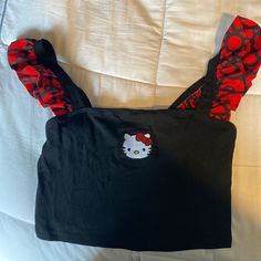 Nwot Hello Kitty Crop Top. Off The Shoulder Frilly Straps. Sold Out Online. I Cut The Tag Out Of The Inside When I Tried It On Because It Was Itchy. Fitted Black Hello Kitty Print Top, Fitted Black Hello Kitty Top, Fitted Black Top With Hello Kitty Print, Y2k Black Hello Kitty Print Top, Casual Black Hello Kitty Top, Cute Black Top With Cat Print, Hello Kitty Crop Top, Frilly Tops, Frilly Top