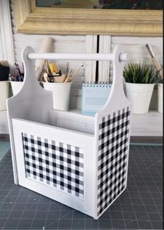 a white and black checkered desk organizer