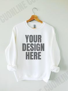 showcase your sweatshirt designs with our hanging white gildan 18000 sweatshirt mockup. The perfect white flat lay hanging mockup to showcase your designs!   ✨Details✨ This is a digital download ONLY This image is for the Gildan 18000 Sweatshirt ✨Download Includes✨ 1 high-resolution JPG free of watermark and branding. ✨Notes✨ THIS IS A DIGITAL PRODUCT, NO physical item will be delivered Once the payment is cleared through Etsy you will receive an email with the download link. You can also download it from the Profile Purchases via Etsy. ✨Terms of Use ✨ THE FOLLOWING PERMISSIONS ARE HEREBY GRANTED TO THE LICENSEE: - You may place your graphic or logo onto the image. - You may crop or rotate the image as needed. - Personal and commercial use is permitted. THE FOLLOWING ACTIONS ARE STRICTLY P Sweater Mockup, Gildan Sweatshirt, Sweatshirt Mockup, White Flat, Gildan Sweatshirts, White Flats, Limassol, White Sweater, Sweatshirt Designs