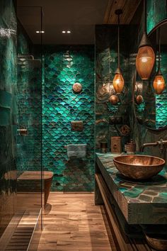 a bathroom with green walls and wood flooring in the shower area, along with a vessel sink