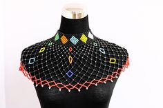 African wedding necklace, Zulu necklace, Beaded shawl necklace, African jewelry, Masai necklace, Bridesmaid necklace, Wedding gift 100% handmade using fine beads. Closure: ball joint Color: multicolored 3-5 days delivery via DHL Express The shipping fee is for the first item only and additional necklaces ship for free. To continue shopping click here: timanacrafts.etsy.com Multicolor Beaded Choker For Wedding, Multicolor Beaded Necklace For Wedding, Multicolor Handmade Choker For Wedding, Multicolor Beaded Chain Necklace For Wedding, Bohemian Wedding Necklace With Large Beads, Bohemian Tiny Beads Necklaces For Wedding, Multicolor Polished Beads Necklace For Wedding, Bohemian Necklaces With Round Beads For Wedding, Bohemian Wedding Necklaces With Tiny Beads