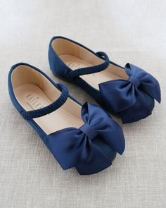 "Simple, sleek and elegant satin ballet flats with added satin bow. Great wear for flower girls, parties, costumes and formal events. MATCHING SATIN BOW HAIR CLIP IS AVAILABLE, CLICK LINK FOR LISTING: https://etsy.me/2sn7HVL DETAILS: COLORS AVAILABLE: White, Red, Champagne, Navy, Pink and Black UPPER: Synthetic upper and lining MATERIALS: Mandmade outsole ORIGIN: Imported STYLE NAME: FREEMAN Not sure of which size to purchase? Shoes measurements are as follow: (Please note measurements taken the Fall Flower Girl, Flower Girls Shoes, Communion Shoes, Birthday Shoes, Bridesmaids Shoes, Satin Ballet Flats, Red Champagne, Tulle Bow, Flower Girl Shoes