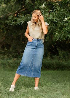 Let us introduce you to the denim skirt you'll want to wear with everything, the Lee A-Line Raw Hem Midi Skirt! This stunning midi denim skirt is an Inherit Design made in the USA! Crafted from high quality, stretchy, medium wash denim that is super soft and will keep you comfortable all day long. The A-line fit is walkable, modest, and on-trend with a raw hem. This sustainable, modest, American-crafted skirt is a true seasonless staple you will wear for years to come! Style | Midi, Denim Color Relaxed Fit Denim Skirt For Fall, Relaxed Denim Skirt For Fall, Denim Relaxed Fit Skirt For Fall, High Rise Dark Wash Skirt For Fall, High Rise Medium Wash Skirt For Fall, Spring High-rise Dark Wash Denim Skirt, Medium Wash Denim Skirt With Frayed Hem For Fall, Dark Wash Denim Midi Skirt, Fall Medium Wash Denim Skirt With Frayed Hem