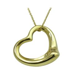 TIFFANY & Co. 18K Yellow Gold Elsa Peretti 27mm Open Heart Pendant Necklace Metal: 18K Yellow Gold Weight: 10.10 grams Pendant: 27mm wide Chain: 18" Hallmark: TIFFANY&Co. © Elsa Peretti 750 SPAIN Condition: New, comes with Tiffany pouch, box and ribbon bow Tiffany price: $3,700 Authenticity guaranteed Luxury Open Heart Necklace With Polished Finish, Gold Heart Pendant Necklace For Formal Occasions, Gold Pendant Heart Necklace For Formal Occasions, Yellow Gold Open Heart Necklace With Polished Finish, Formal Yellow Gold Open Heart Necklace, Luxury Yellow Gold Heart Pendant Necklace, Classic Gold Heart Necklace With Polished Finish, Luxury Gold Heart Pendant Necklace, Classic Gold Heart Necklace For Formal Occasions