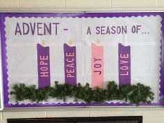 a bulletin board on the wall above a fire place with candles and garland around it