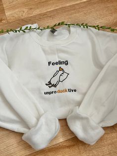 Feeling unproductive embroidered duck sweatshirt! All sweatshirts are made within 1-3 weeks. How to order: 1. Select your size 2. Select the colour you would like for your sweatshirt 3. Add to basket and place order Sweatshirt: 50% cotton/50% polyester Unisex design, great for everyone! Colour - Optional (if a colour is out of stock I will message you to notify you) Fit - True to size (if you would like to order a different size that is not listed please message me) Duck Sweatshirt, Goofy Shirt, Embroidered Duck, Funny Duck, Embroidered Sweater, Simple Trendy Outfits, Funny Sweatshirts, The Colour