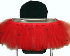 a red tutu with black dots on it