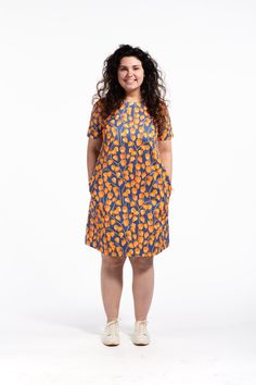 "ABOUT: A handmade physalis dress made of my original watercolor drawings. It has seam pockets on each side. 100% cotton, 230 gsm and washable at 40 degrees. Printed and sewn in the Czech Republic. *Please note: the position of the imagery may vary with each item. Sandra is US size 12, is 160cm / 5'2\" tall and is wearing size M. SIZE: XS (US 4-6, UK 8-10, AUS 8-10, Germany 34-36, Italian 40-42, French 36-38) Bust: 82-86cm / 32\"-33\" Waist: 64-68cm / 25\"-26\" Hips: 86-90cm / 33\"-35\" S (US 6- Orange Cotton Dress With Pockets, Casual Short Sleeve Fruit Print Dresses, Orange Short Sleeve Dress With Pockets, Orange Sleeveless Dress With Floral Embroidery, A-line Shift Mini Dress In Solid Color, Orange Cotton Knee-length Dress, Dress Watercolor, Floral Print A-line Shift Mini Dress, Orange Floral Dress