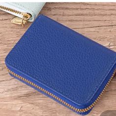 Introducing This Stylish And Functional Wallet, Perfect For Carrying Your Credit Cards And Other Small Essentials. The Sleek Design Features A Chic Blue Durable Pu Leather Material, A Secure Zip-Around Closure, And Convenient Multiple Card Slots. The Wallet Measures 4 Inches In Wide And 3.5 Inches In Height , Making It The Perfect Size For Everyday Use.Stunning Gold Zipper. Brand New Elegant Blue Coin Purse With Card Slots, Blue Coin Purse With Interior Card Slots, Blue Wallets With Card Slots For Daily Use, Light Blue Wallet With Card Slots For Everyday Use, Blue Everyday Coin Purse With Card Slots, Blue Wallets With Interior Card Slots For Daily Use, Blue Wallet With Zipper Closure For Daily Use, Blue Wallets With Zipper Closure For Daily Use, Blue Travel Wallets With Card Slots