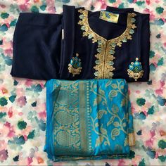 Desi Indian Punjabi Suit Navy Blue Suit With Light Blue Chunni Festive Blue Fitted Sets, Fitted Blue Unstitched Suit For Festive Occasions, Festive Fitted Blue Unstitched Suit, Fitted Blue Palazzo Set For Eid, Festive Blue Fitted Unstitched Suit, Elegant Blue Sets With Zari Work, Blue Unstitched Sets With Zari Work, Elegant Blue Unstitched Suit For Festive Season, Festive Fitted Blue Palazzo Set