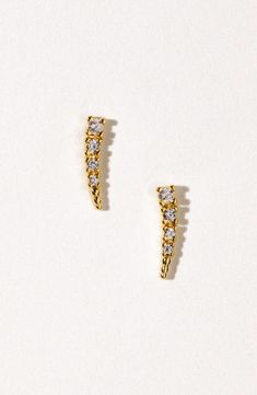 Add light sparkle to any ensemble with these curved, graduated stud earrings alight with pavé cubic zirconia. 1/2" drop Post back 18k-gold fill/cubic zirconia Made in the USA of imported materials Child Of Wild, Contemporary Accessories, Tory Burch Handbags, Gold Overlay, Cz Stud Earrings, Wild Child, Luxury Watches For Men, Watch Necklace, Gold Earrings Studs