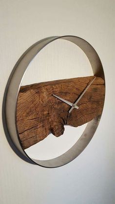 a clock made out of wood and metal