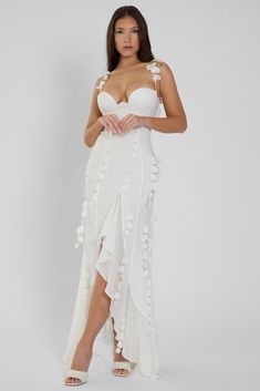 The most exception dress you'll ever meet - our Ivy Petal Bustier Maxi Dress is designed for your most glamorous events and it's just as perfect in person as it is in the pictures (even better!) Delicately adorned with lightweight petal detail accentuated with gold hardware, the white chiffon maxi dress falls down your body to an asymmetrical, ruffled hemline. Summer Party Wedding Dress With Sweetheart Neckline, Summer Wedding Dress With Sweetheart Neckline For Party, Glamorous Floral Dress With Sweetheart Neckline, Floral Embellished Sweetheart Neckline Dress For Prom, Floral Sweetheart Neckline Dress For Prom, Floral Embellished Evening Dress With Sweetheart Neckline, Party Wedding Dress With Sweetheart Neckline And Lined Bodice, Sweetheart Neckline Wedding Dress With Lined Bodice For Party, Party Wedding Dress With Sweetheart Neckline