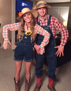 a man and woman dressed up in cowboy outfits