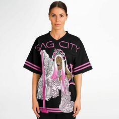 Nicki Minaj Tour | Pink Friday 2 Jersey | Gag City Shirt Hi, Barbz! These are created as ordered, so, no refunds or exchanges. Pleaseeee ask me any and all questions necessary and check size guide and your measurements before ordering. Thank you so so much. <3 <3 !! Be the best dressed person in your crew while still staying casual with this cool football jersey! The unisex style makes it flattering for everyone of all shapes and sizes. Whether you’re on the football field attempting a hat trick Trendy Cotton Blouse With Graphic Print, Hip Hop Style Relaxed Fit Tops For Concert, Relaxed Fit Hip Hop Tops For Concert, Hip Hop Tops For Spring Concert, Trendy V-neck Shirt With Graphic Print, Hip Hop Relaxed Fit Tops For Concert, Trendy Sublimation Print Tops For Concerts, Trendy Tops With Sublimation Print For Concerts, Cotton Top With Sublimation Print For Concert