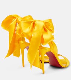 Luxury Spring Heels With Satin Bow, Luxury Summer Heels With Satin Bow, Luxury Satin Heels For Spring, Luxury Satin Sandals, Party Heels With Satin Lining, Summer Satin Ankle Tie Heels, Luxury Party Sandals With Satin Bow, Satin Sandals For Evening With Pointed Toe, Evening Satin Sandals With Pointed Toe