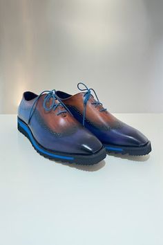 Blue leather brogues with perforated toe and ombre upper. - Aza Fashions Blue Low-top Dress Shoes For Business, Blue Low-top Dress Shoes For Formal Occasions, Blue Wingtip Oxfords With Brogue Detailing, Blue Wingtip Dress Shoes With Brogue Detailing, Formal Blue Low-top Leather Shoes, Blue Business Dress Shoes With Textured Sole, Blue Leather Cap Toe Shoes With Brogue Detailing, Blue Wingtip Oxfords With Rubber Sole, Blue Oxfords With Brogue Detailing