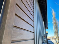 the side of a building with wood siding