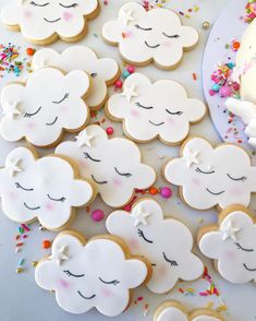 some cookies that have been decorated with icing and sprinkles