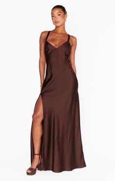 Raise a glass in the Anderson Maxi Dress! Sleek, chocolate satin shapes this chic dress with an open back and criss cross ties. This flattering, floor length dress exudes glamour. Style with strappy heels and dainty gold jewelry for your next event. Tan Bridesmaid Dresses, Beige Bridesmaid Dress, Maternity Dress Wedding Guest, Brown Dresses Formal, Beige Bridesmaids, Neutral Bridesmaid Dresses, Maternity Bridesmaid Dresses, Floral Bridesmaid Dresses, Plus Size Mini Dresses